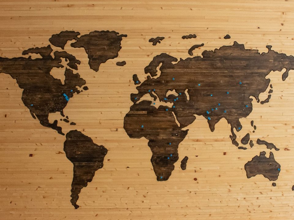 Wooden world map for planning travel routes